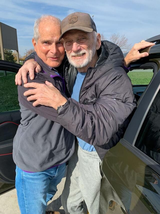 MEN HUG BY CAR .jpg